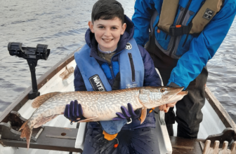 Young Lorcan puts Santa’s present to great use on Lough Erne | Fishing in Ireland