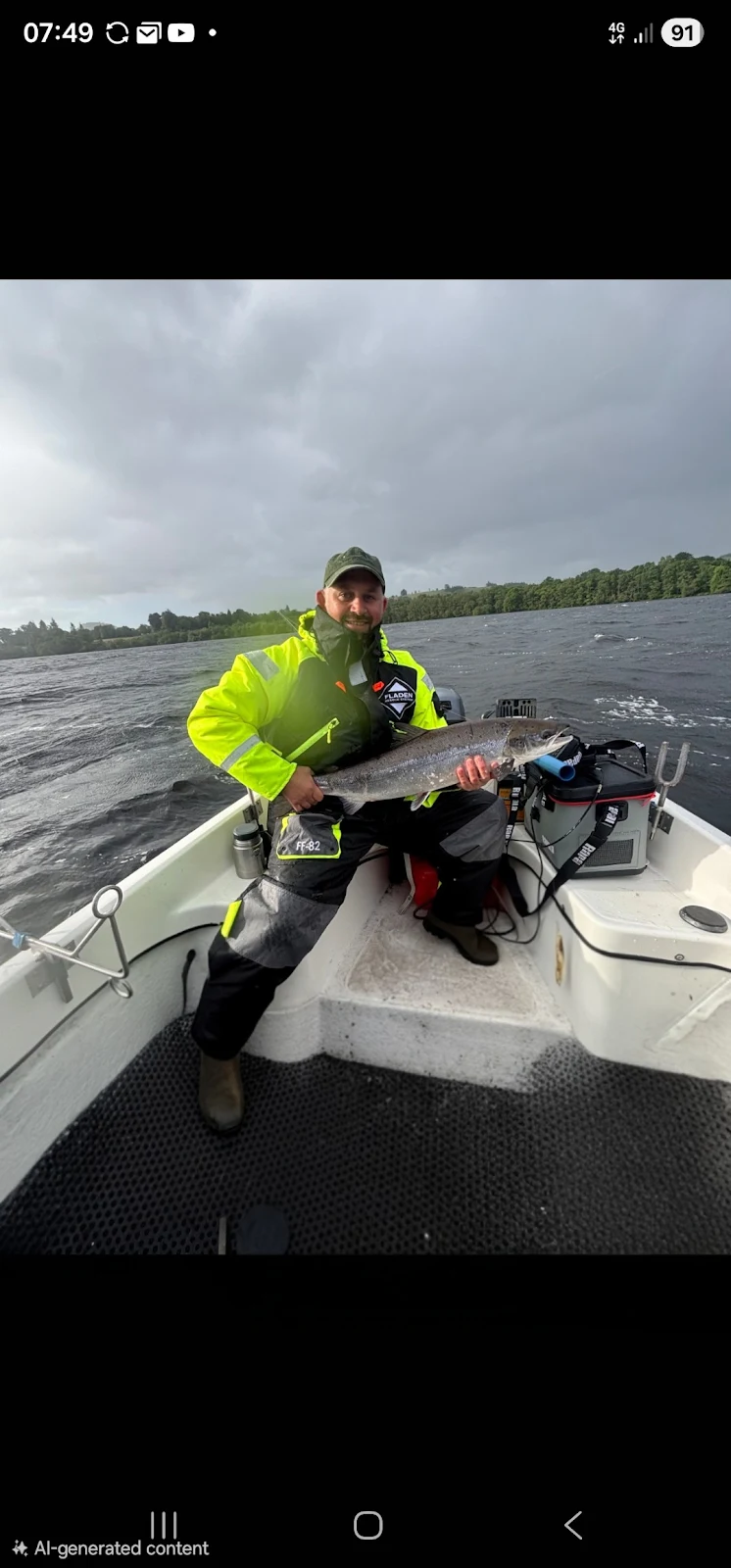 Jamie Arthur with a Salmon caught on an 18g Toby on Loch Lomond