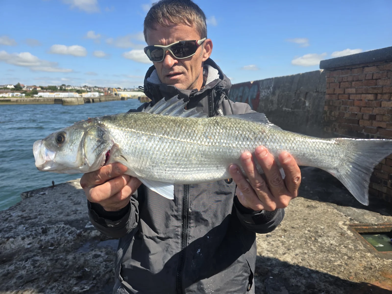 James Saunders with a Bass caught on a Savage Gear Seeker at Methil Breakwater