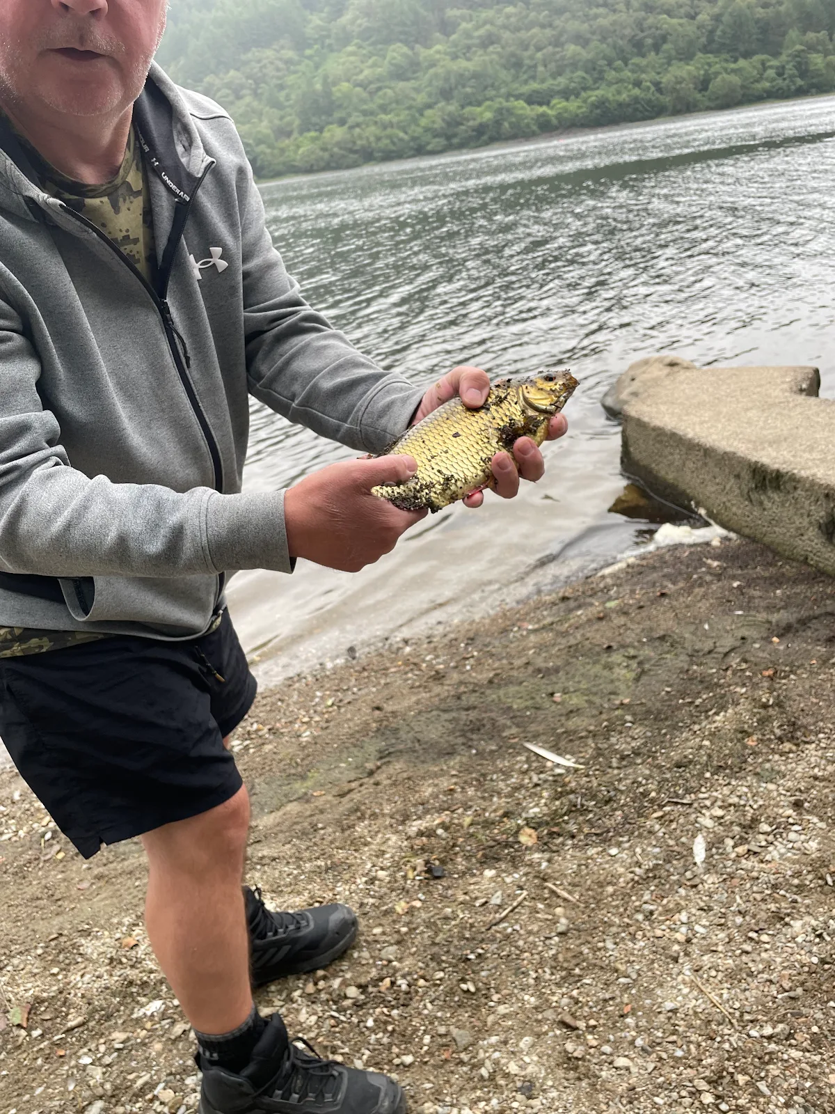 Jim Harvey's grandson Finlay Corbet aged 7 with a Rudd caught at Loch Lubnaig