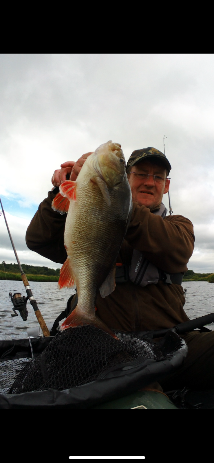 Craig McFarlane with a big Perch caught dropshotting from his kayak at the mouth of the river