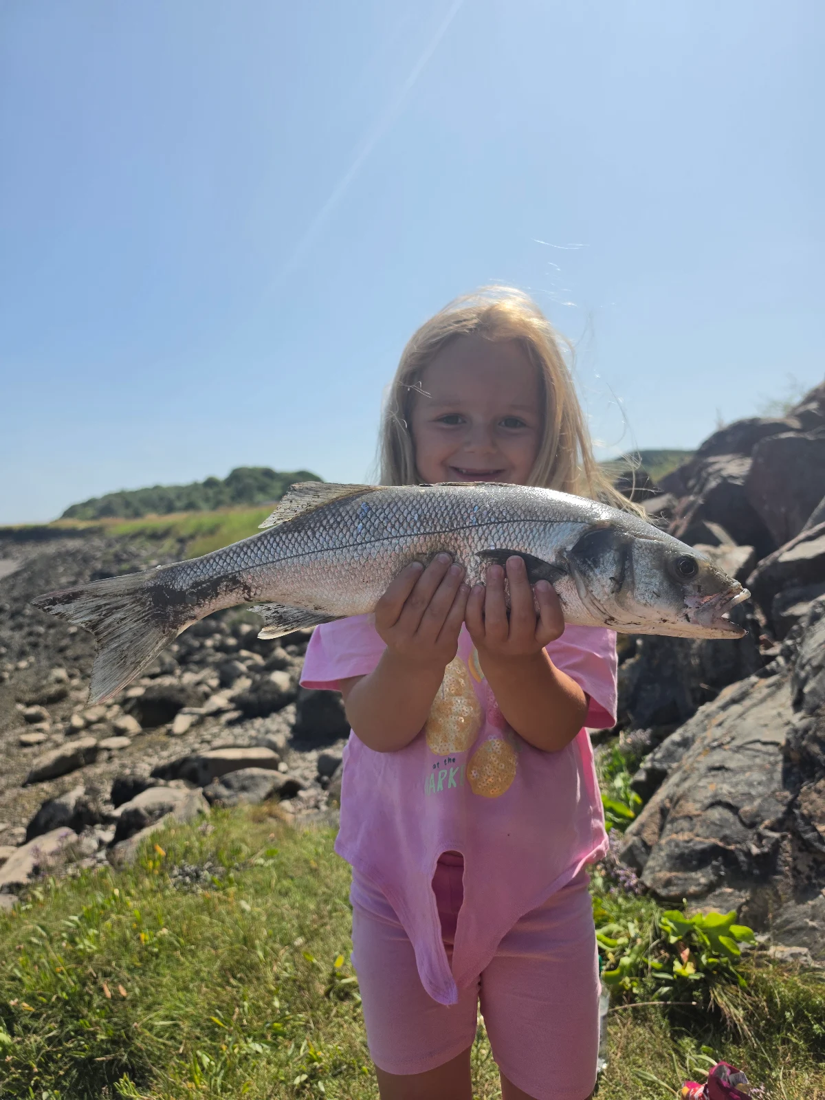 Gracie McGarva with a 56cm Bass caught on peeler crab in the Solway Estuary on her first ever fishing trip